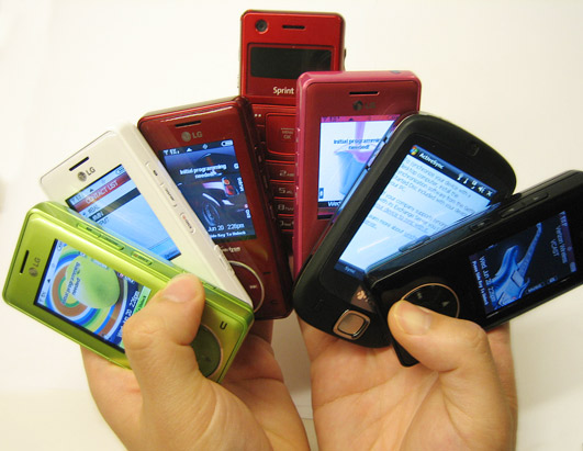http://theunlockr.com/wp-content/uploads/2009/10/Too-Many-Phones.jpg